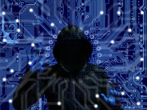 Cybersecurity audit highlighting hacker risks within digital networks, focusing on data protection against cyber threats.